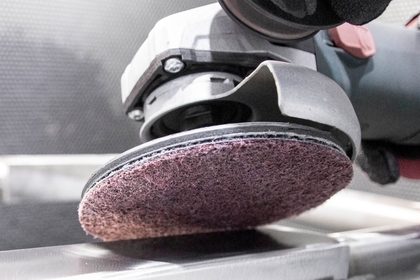 Surface conditioning non-woven