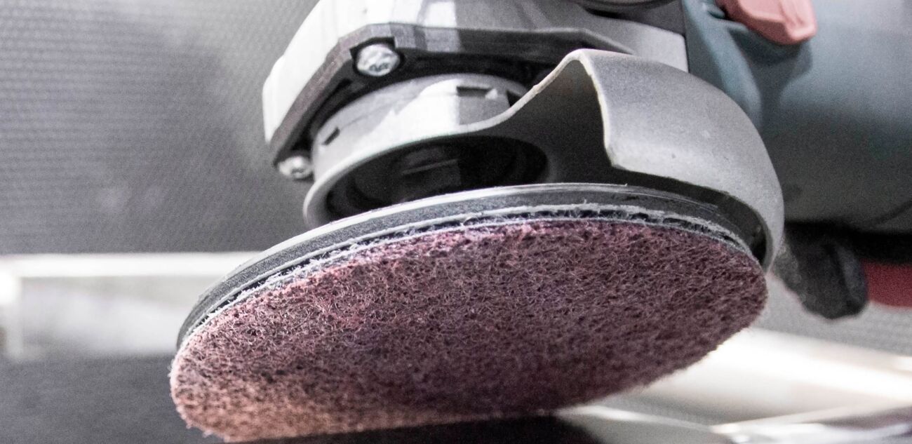 Surface conditioning non-woven